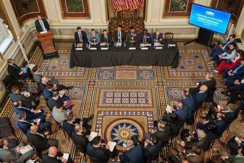 Overhead view of the convening panel and audience